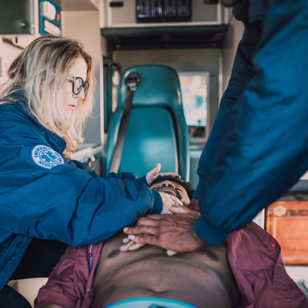 Female and male help the patient in performing CPR Cardio Pulmonary Resuscitation